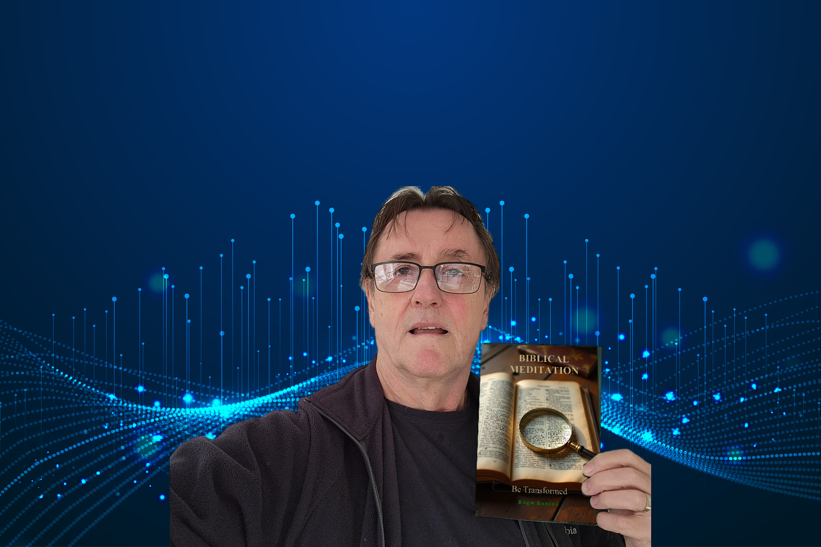 Roger Robins holding his book, The Definitive Guide to Spiritual Warfare